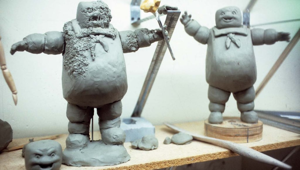 Two Stay Puft maquettes, the left one showing his badly burned look.