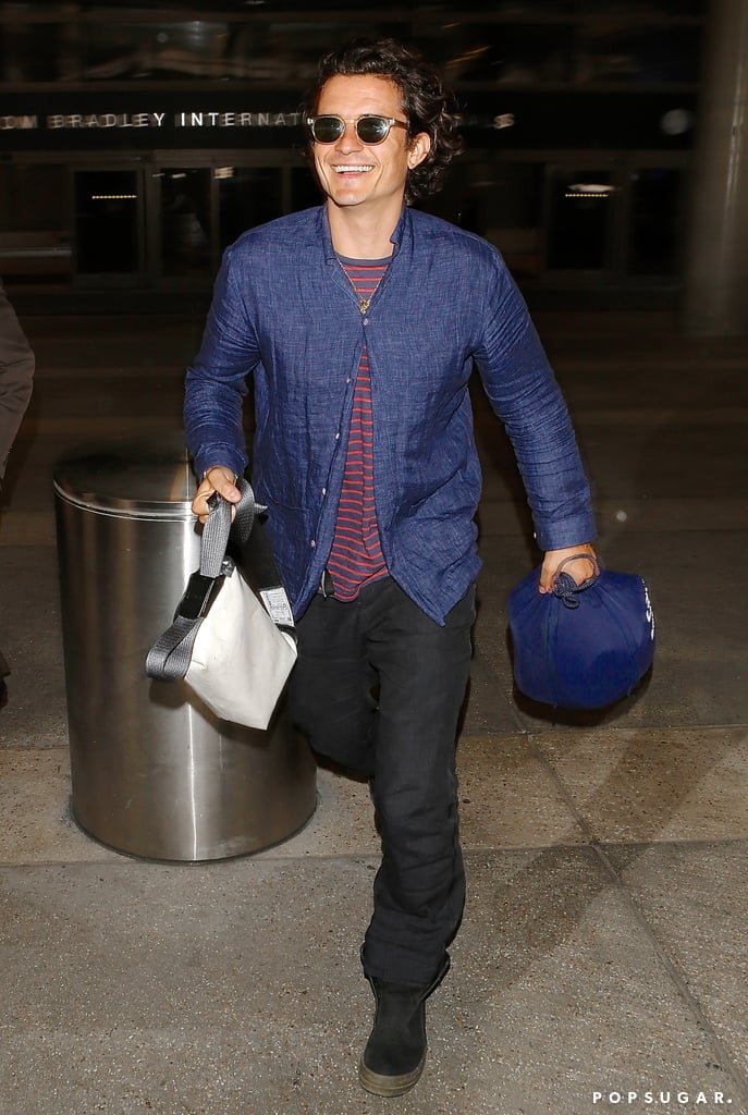 Orlando Bloom smiled at LAX on Tuesday.