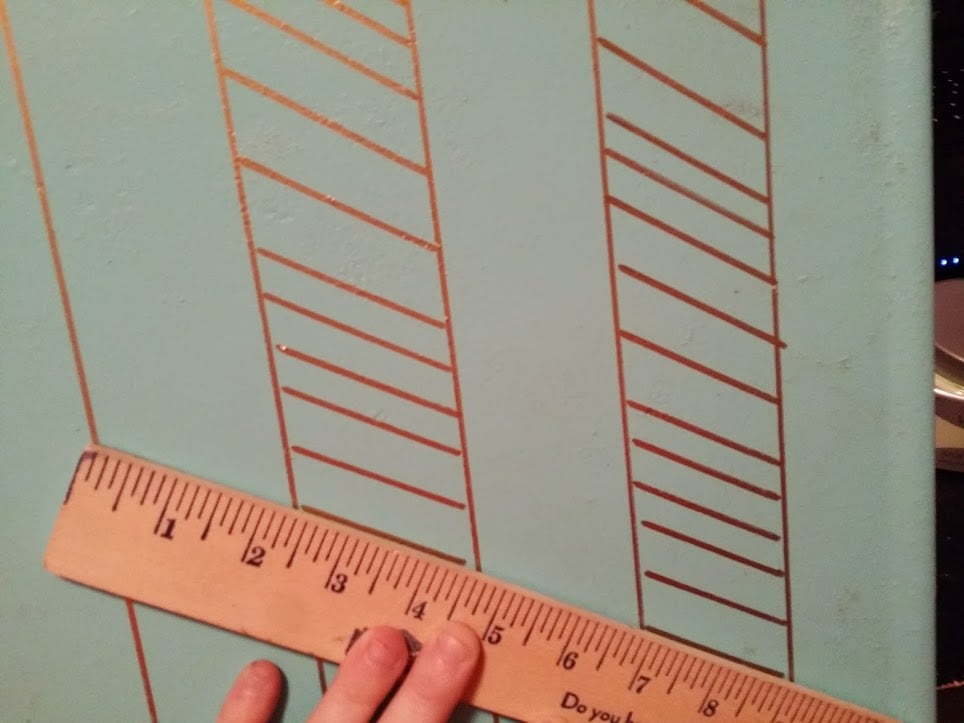 Sure, it was covered in rust, but using an electric drill with a wire-brush attachment took most of it off. Next, Stacey primed and painted the cart and created a herringbone pattern with a ruler. 
Source: Addison Meadows Lane via Hometalk