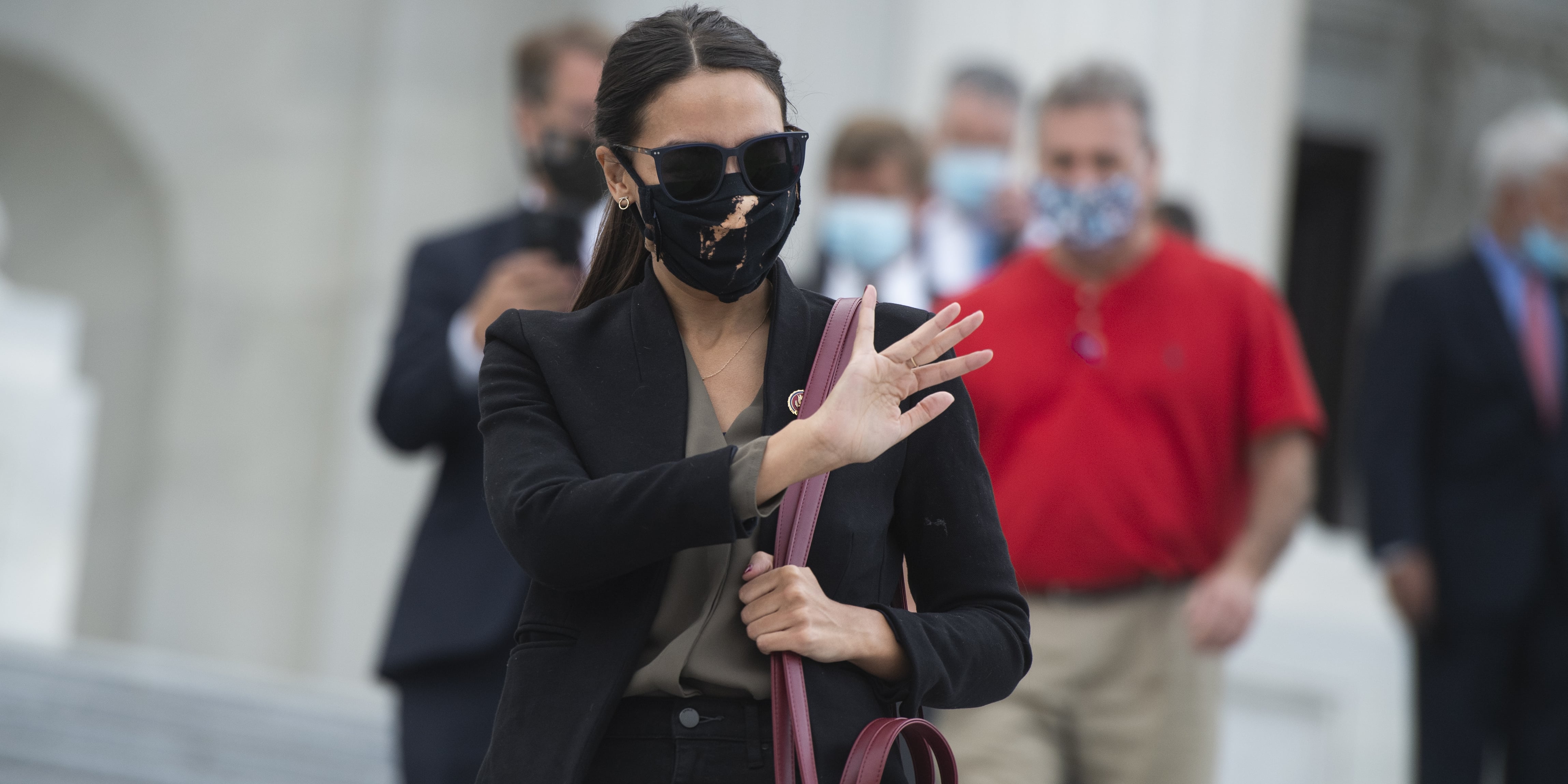 Alexandria Ocasio-Cortez Is Obsessed With Her Telfar Bag - PAPER Magazine