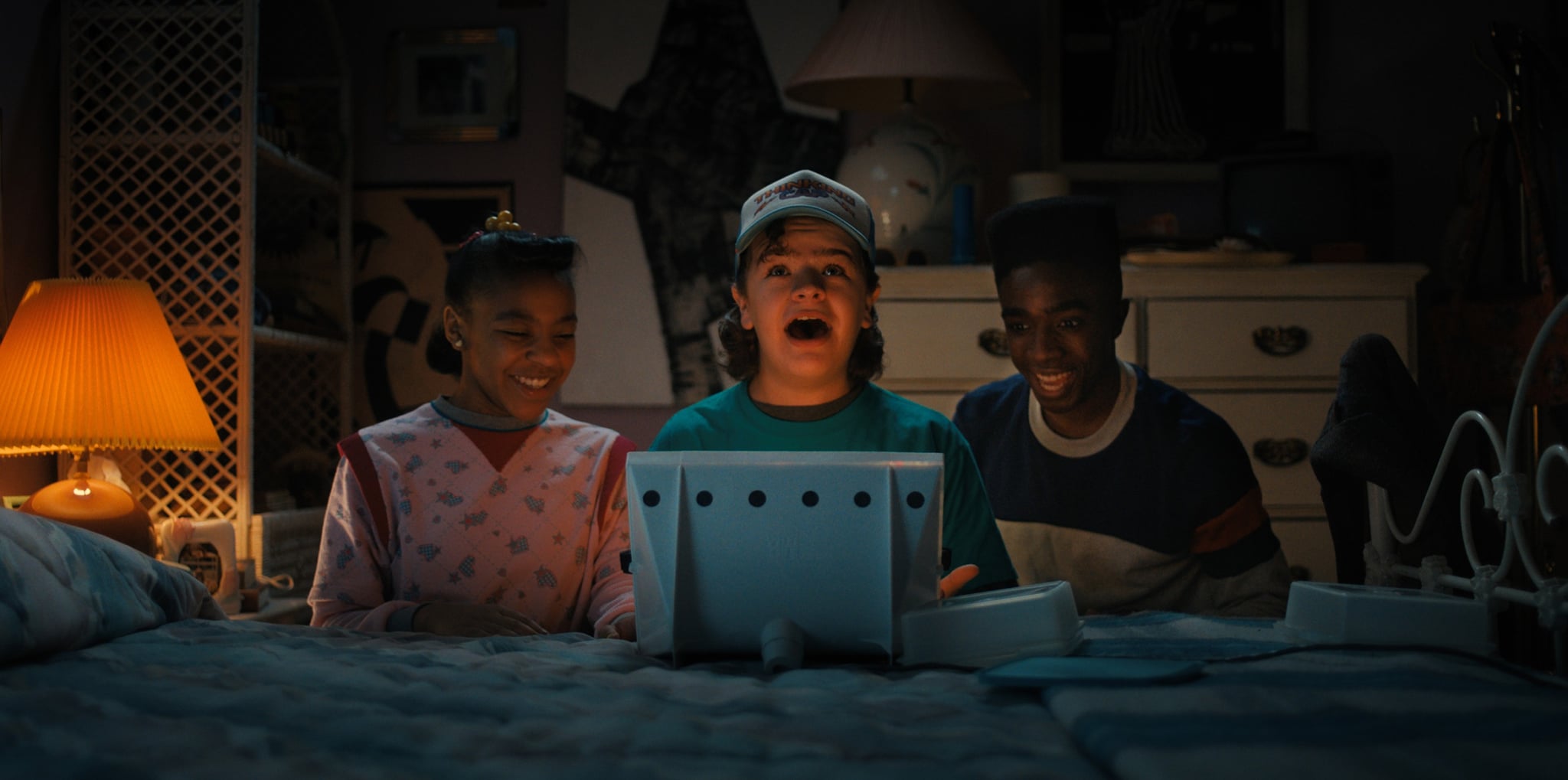 Stranger Things, from left: Bria Ferguson, Gaten Matarazzo, Caleb McLaughlin, (season four, aired May 27, 2022).  ph: Netflix / Courtesy Everett Collection