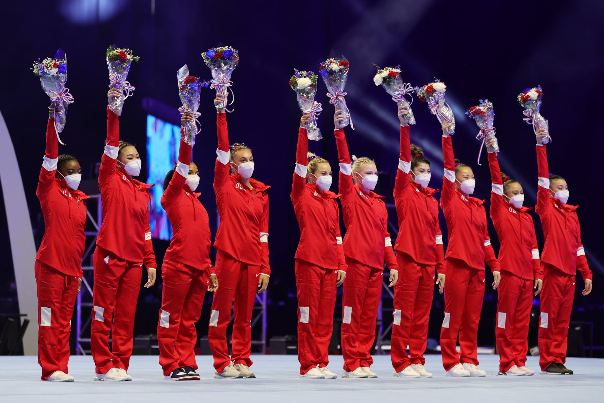 ST LOUIS, MISSOURI - JUNE 27: (L-R) Simone Biles, Suni Lee, Jordan Chiles, Grace McCallum, MyKayla Skinner, Jade Carey, Kayla DiCello (replacement), Kara Eaker (replacement), Leanne Wong (replacement), and Emma Malabuyo (replacement) pose after being selected to the 2021 U.S. Olympic Gymnastics team following the Women's competition of the 2021 U.S. Gymnastics Olympic Trials at America's Center on June 27, 2021 in St Louis, Missouri. (Photo by Carmen Mandato/Getty Images)