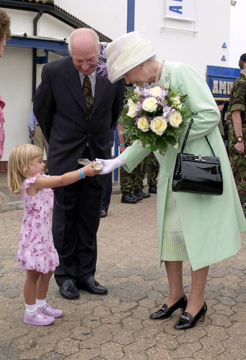 When This Little Girl Just Couldn't Wait to Present Her Gift to the Queen