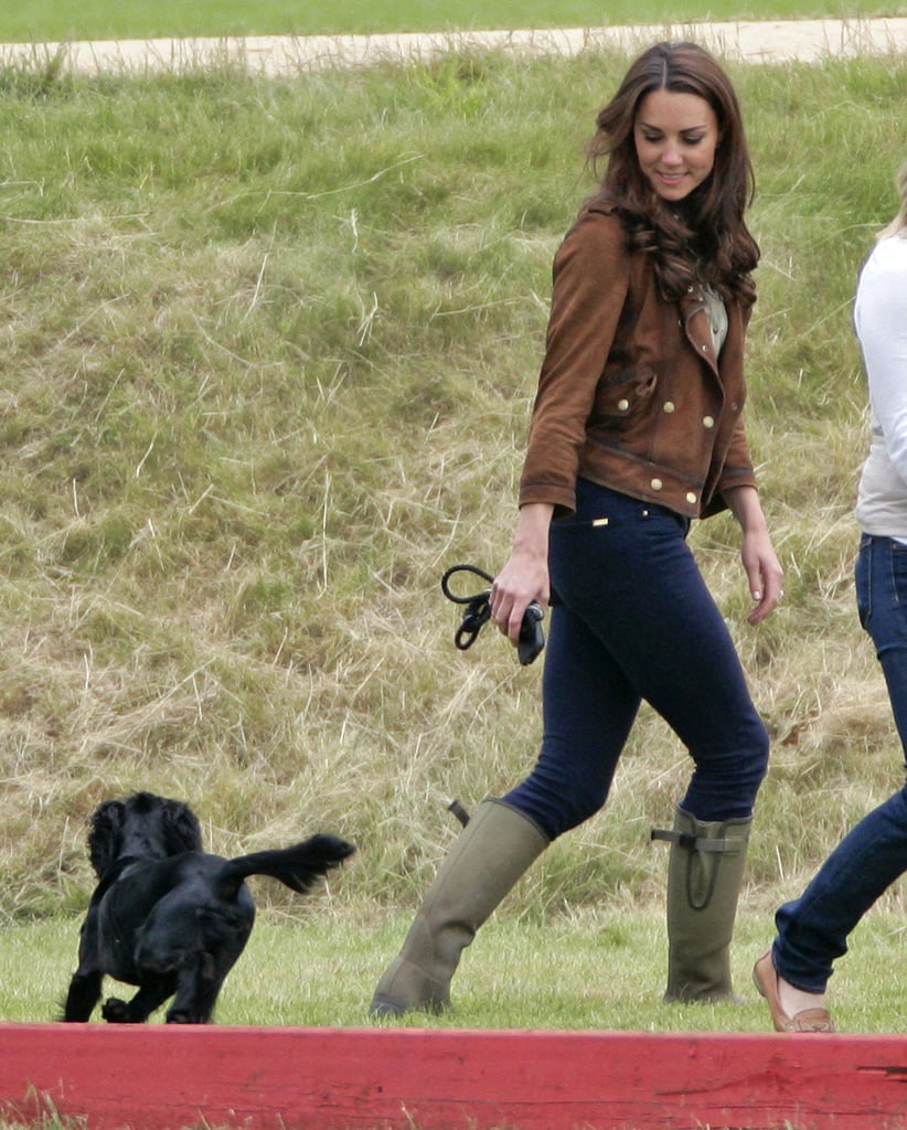 Kate's brown leather coat and work boots made her outfit appear functional.