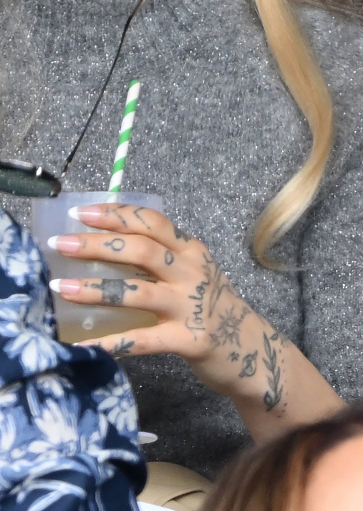 Ariana Grande's Left Hand and Finger Tattoos