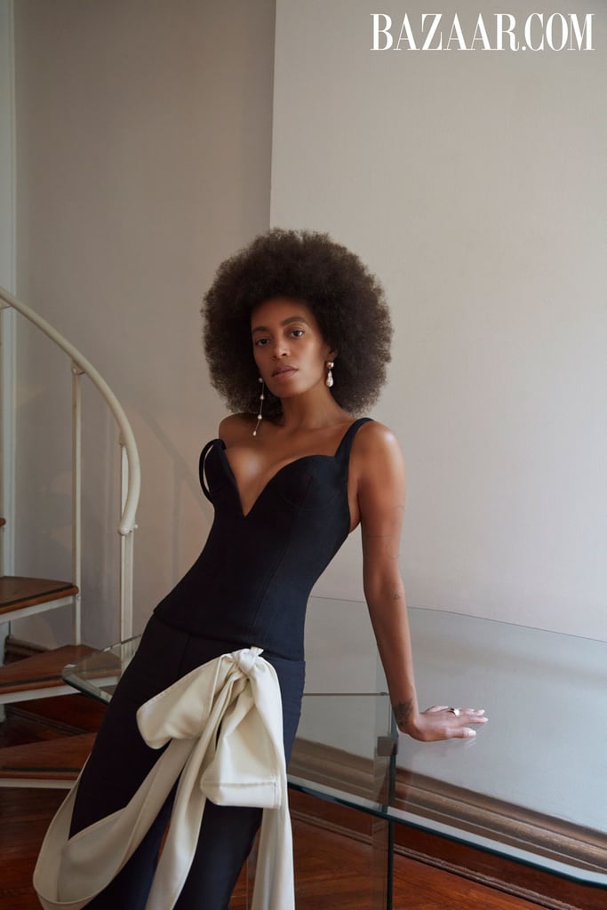 Solange wears a LaQuan Smith top and a Super Yaya skirt in this gorgeous shot, along with jewelry from Sophie Buhai.