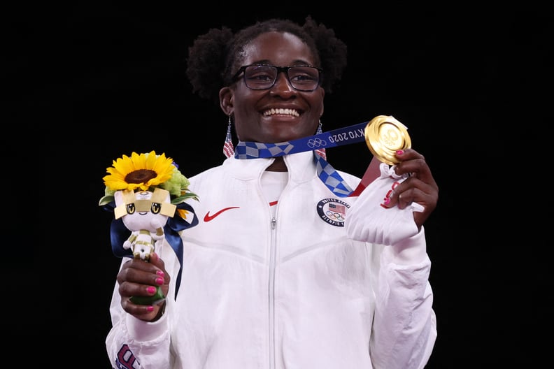Gold medalist USA's Tamyra Marianna Stock Mensah poses with her medal after the women's freestyle 68kg wrestling competition of the Tokyo 2020 Olympic Games at the Makuhari Messe in Tokyo on August 3, 2021. (Photo by Jack GUEZ / AFP) (Photo by JACK GUEZ/A