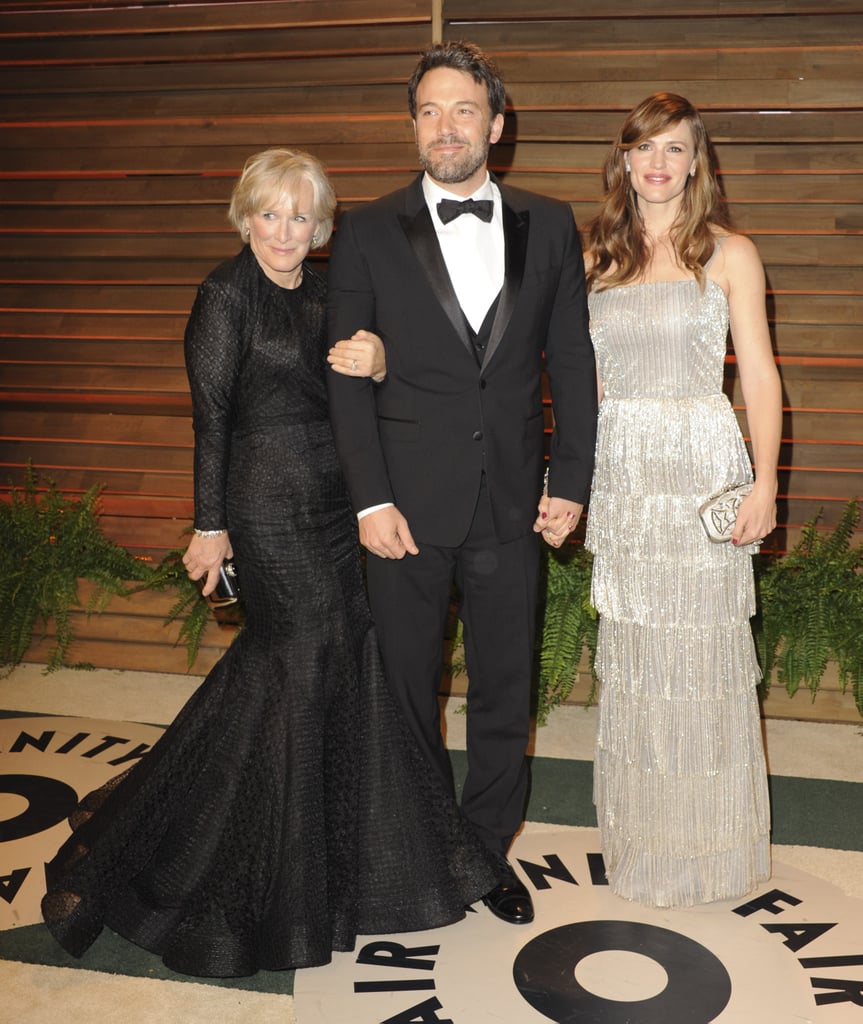 Ben Affleck may have skipped the Oscars, but he did get in on the fun when he joined his wife Jennifer Garner at Vanity Fair's annual post-awards-show bash in LA on Sunday. He also got a special little surprise when Glenn Close sidled up to him, grabbed his arm, and scored a very classy photobomb. (Don't worry, both Ben and Jennifer seemed to enjoy Glenn's antics.) Earlier in the evening, Jennifer had taken a solo trip to the Academy Awards, where she worked as a presenter and also cheered on her Dallas Buyers Club costars Matthew McConaughey and Jared Leto as they took home two big acting awards. Last week, Ben made headlines when he traveled to Washington DC to testify in a Senate hearing about the state of the Democratic Republic of Congo. His visit went viral after he had an awkward handshake with Secretary of State John Kerry following his testimony.