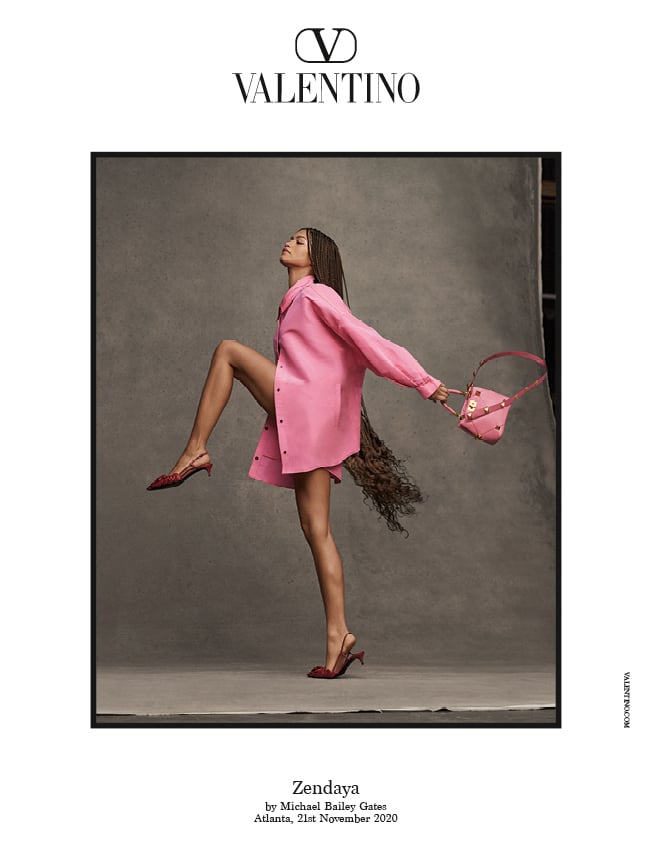 Zendaya in a pink Valentino overshirt, Valentino Garavani Atelier 03 Rose Edition Slide Sandals, and the small pink Roman Stud The Handle Bag.