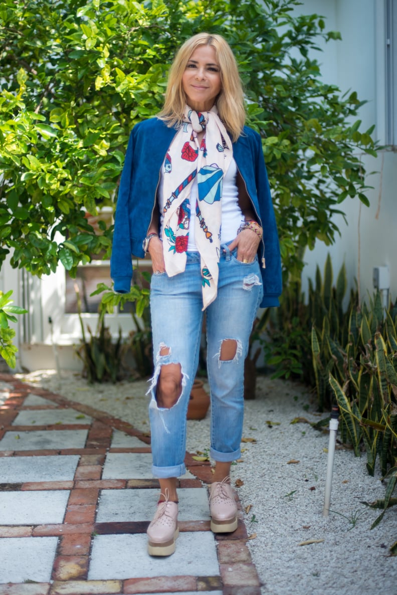 With Distressed Jeans, a Colorful Handkerchief, a Blue Jacket, and Creepers