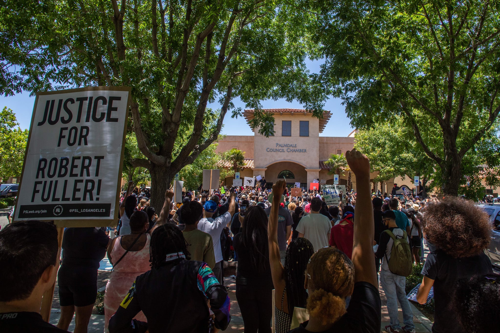 People protest in front of Palmdale Sheriffs Station on June 13, 2020 to demand a full investigation into the death of Robert Fuller, a 24-year-old black man found hanging from a tree, in Palmdale, California. - Protesters blasted city and sheriff's officials for quickly deeming it a suicide without exploring the possibility of a hate crime. Robert Fuller's body was found with a rope around his neck, hanging from a tree just before 4 am on June 10, 2020, in Poncitlan Square, across from City Hall, according to Lt. Brandon Dean of the Los Angeles County Sheriff's Department. (Photo by Apu GOMES / AFP) (Photo by APU GOMES/AFP via Getty Images)