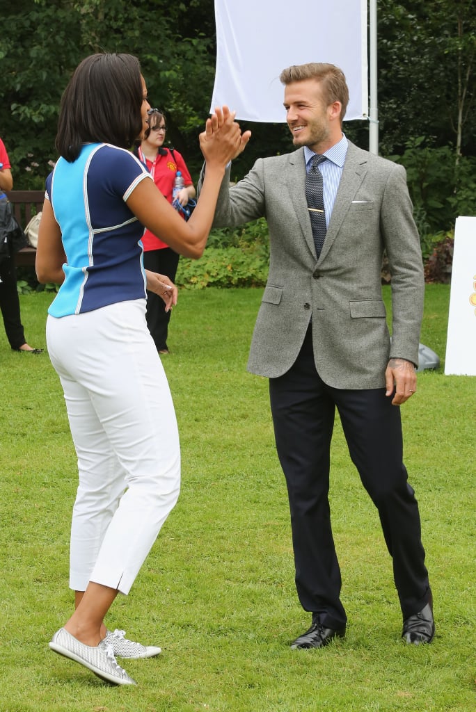 In July 2012, First Lady Michelle Obama high-fived David Beckham during a Let's Move London event.