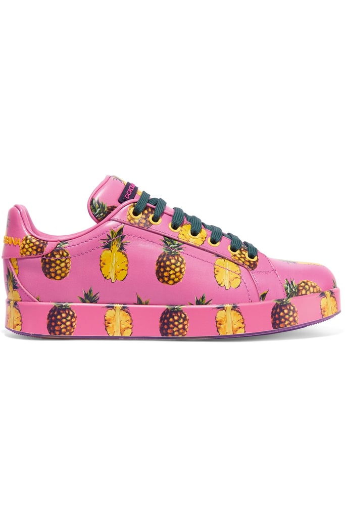The Dolce & Gabbana's Printed Leather Sneakers ($875) make for a tropical splash in your wardrobe.