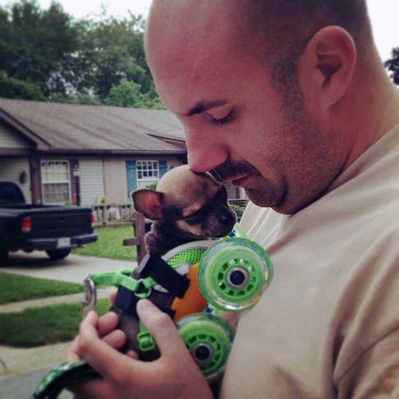 The happily mobile pup with his new family. 
Source: Instagram user turbo.roo