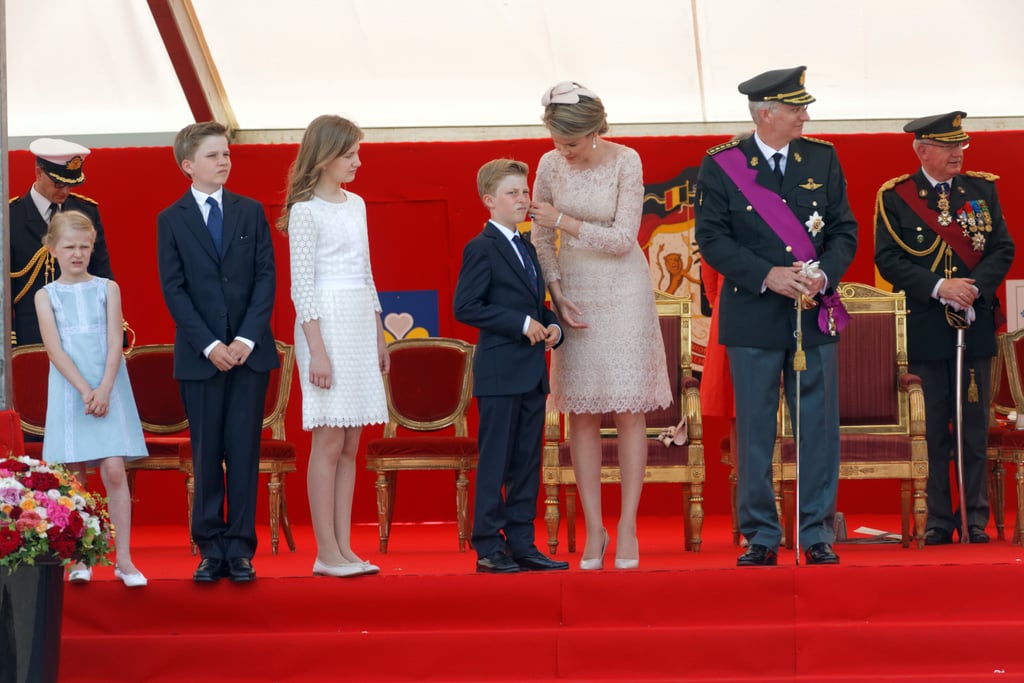 The Queen was attentive to her young son during a military parade in 2016.