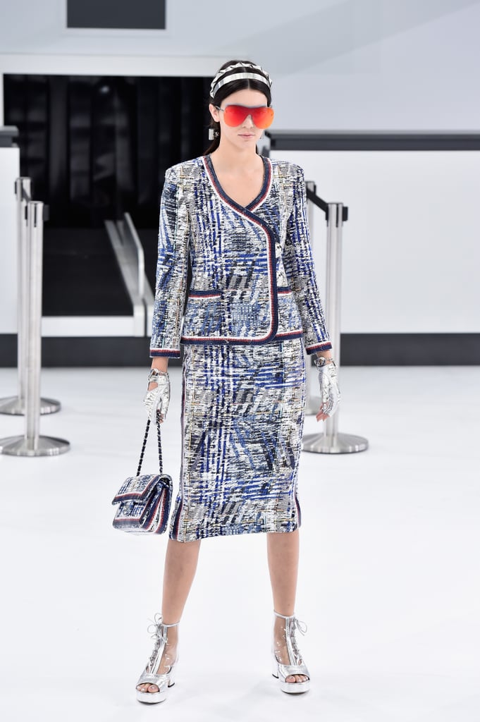 Kendall was suited up and ready to fly at the Chanel show.