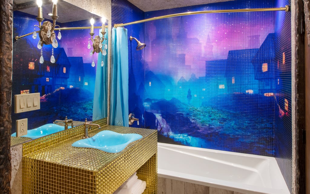 An Elegant Cinderella-Inspired Bathroom With a Mesmerizing Shower Mural