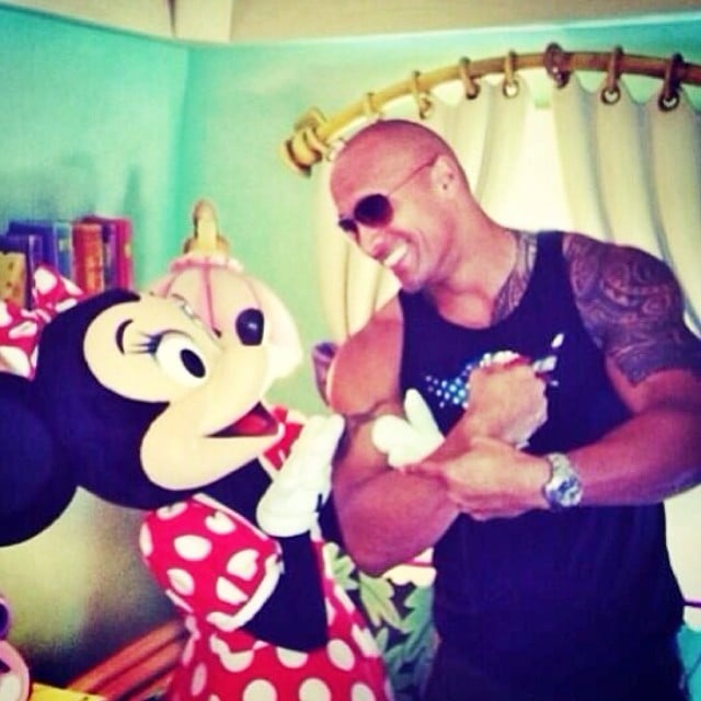 Dwayne Johnson had fun with Minnie Mouse. He claims, "She's a muscles, rough hands and tattoos kind of gal."
Source: Instagram user therock