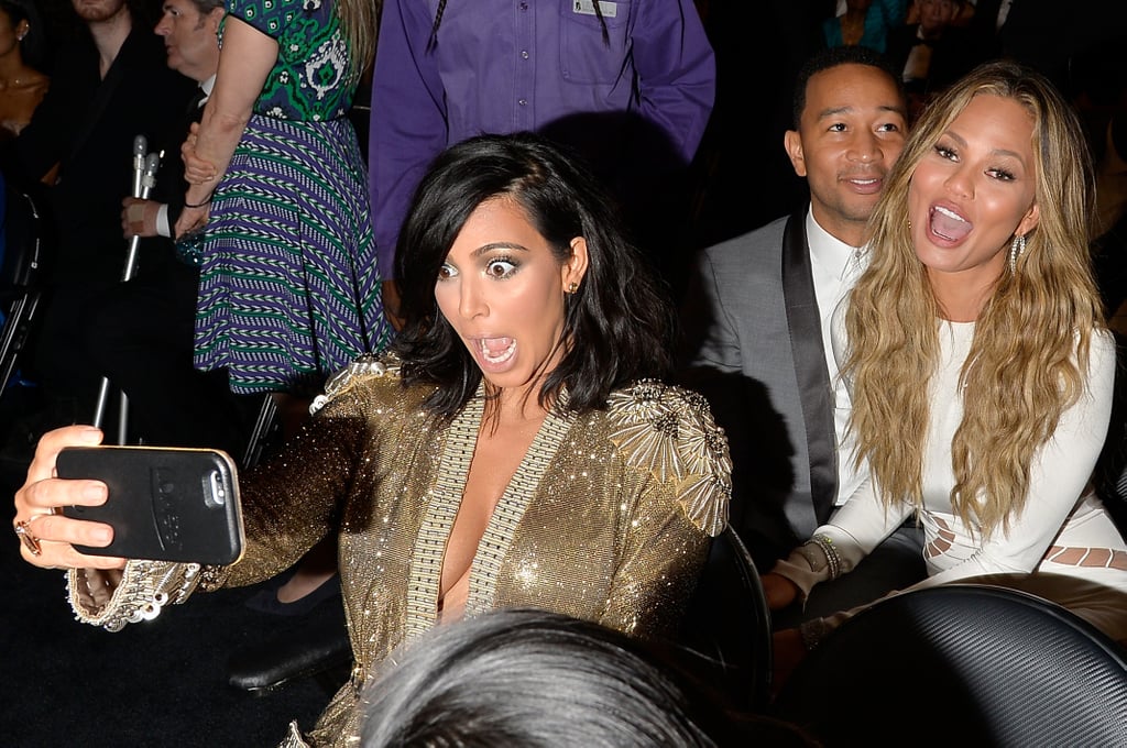 The undisputed Queen of selfies, Kim Kardashian, nails a photo with a friendly photobomb from John Legend and Chrissy Teigen during the Grammy Awards in February 2015.