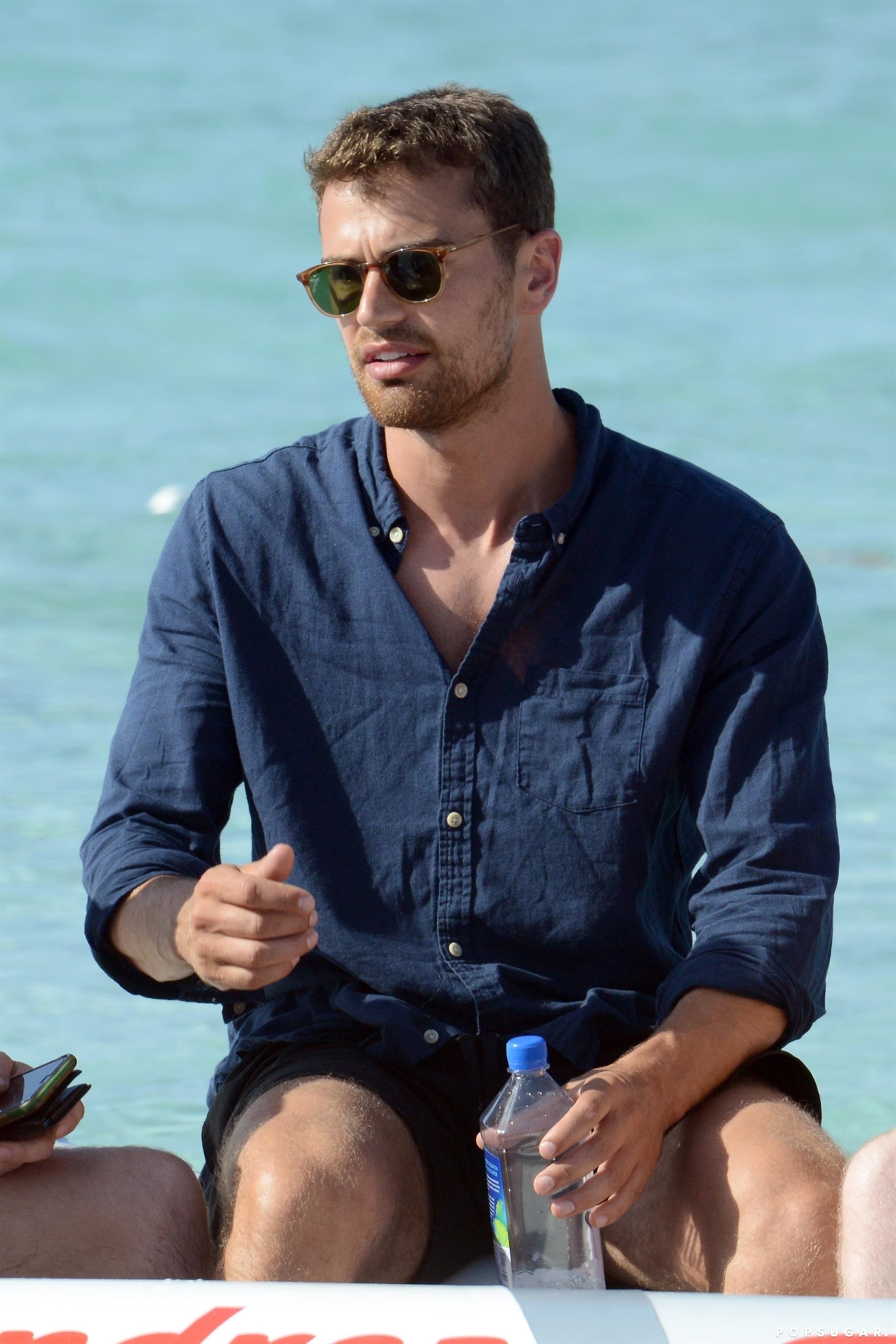 Theo James On The Beach In Spain July 2017 Popsugar Celebrity Theo james was born on december 16, 1984 in oxford, oxfordshire, england, united kingdom as theodore peter james kinnaird taptiklis. theo james on the beach in spain july