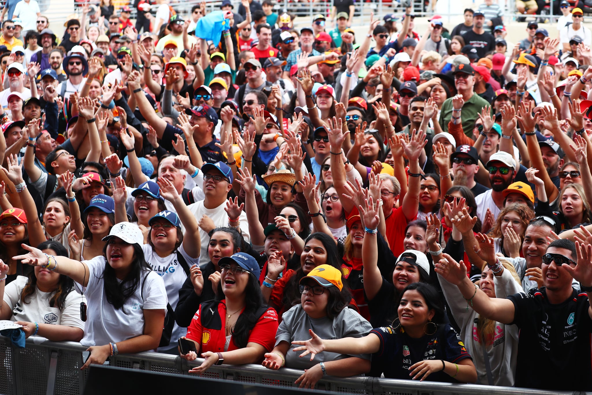 AUSTIN, TEXAS - OCTOBER 18: Fans enjoy the atmosphere at the fan stage prior to practice ahead of the F1 Grand Prix of United States at Circuit of The Americas on October 18, 2024 in Austin, Texas. (Photo by Peter Fox - Formula 1/Formula 1 via Getty Images)