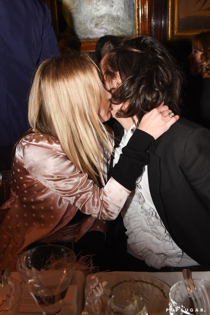 Kate gave Harry a kiss during the dinner.
