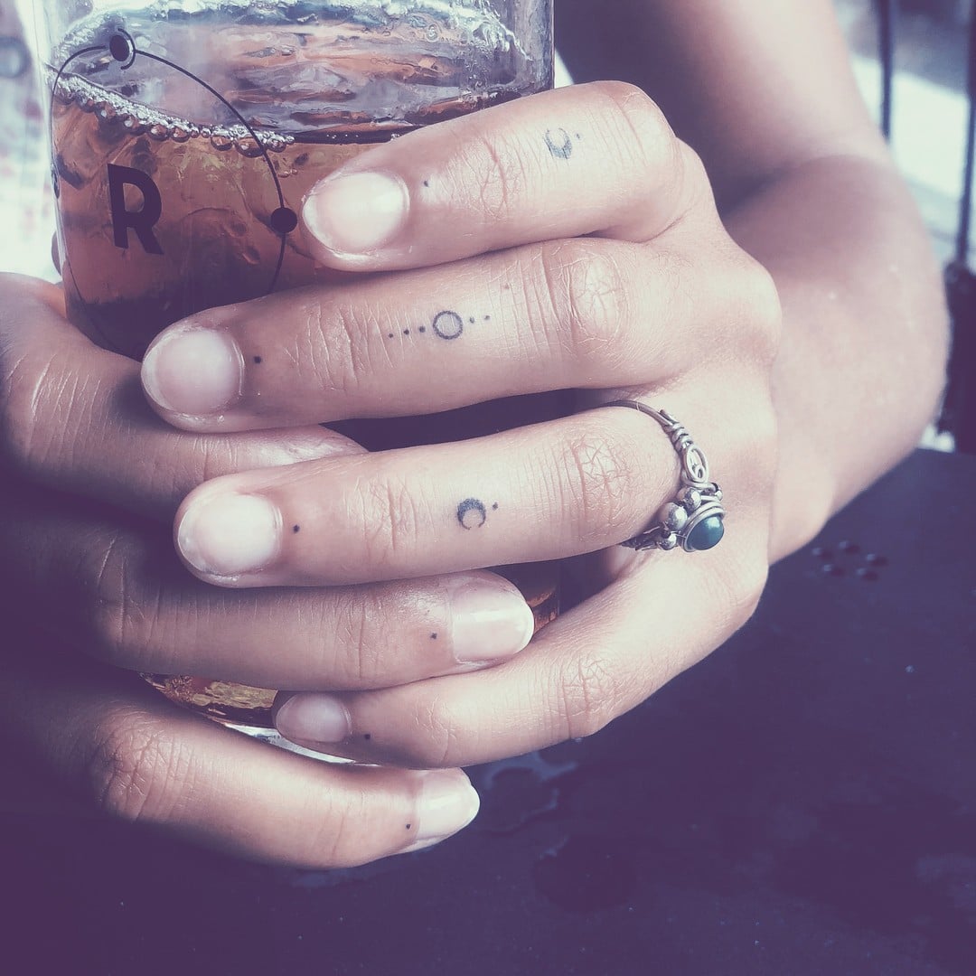 Tiny Finger Tattoo