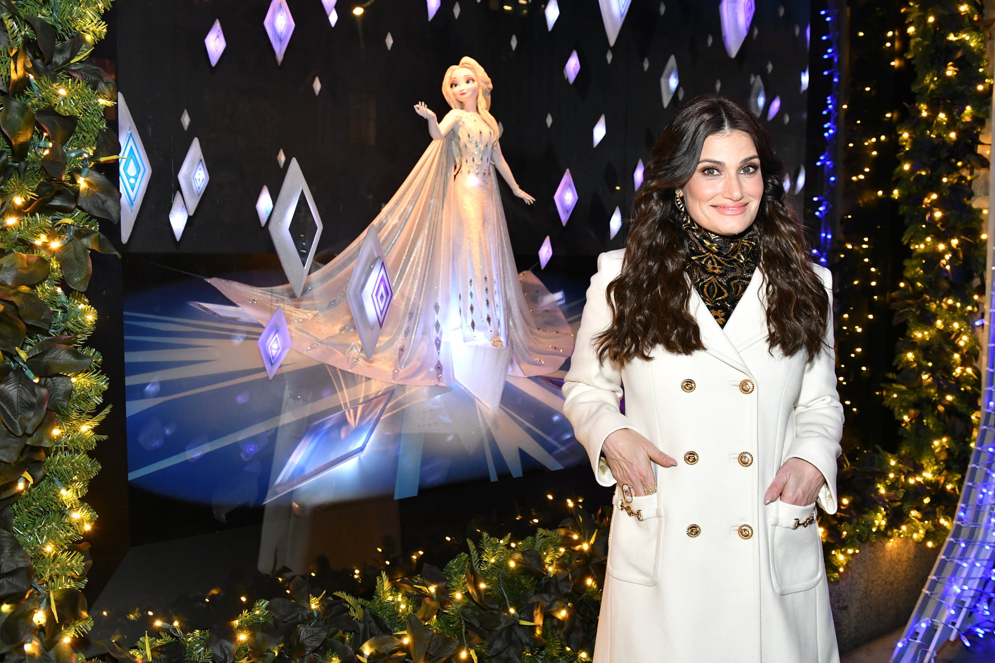  Idina Menzel poses during the Disney and Saks Fifth Avenue unveiling of 