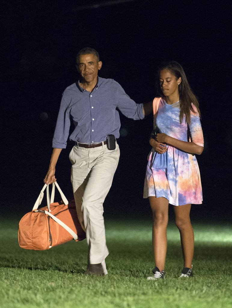 Wearing a breezy tie-dye three-quarter-sleeved dress.