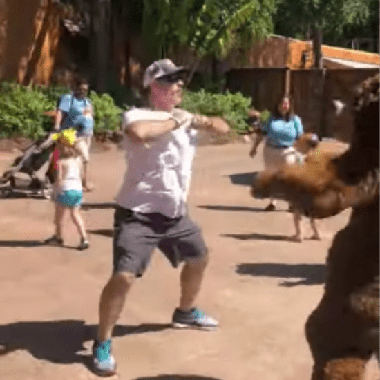 Man Dancing With Bear at Disney's Animal Kingdom