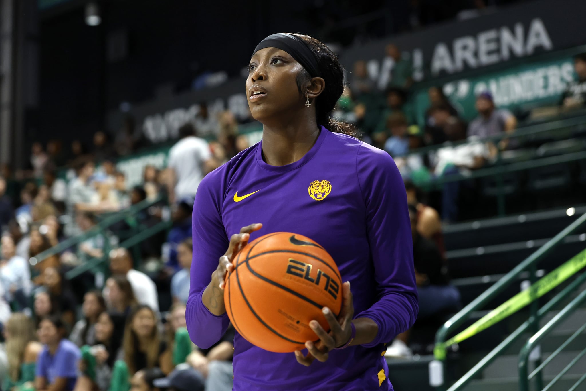NEW ORLEANS, LOUISIANA - NOVEMBER 17: Flau'Jae Johnson #4 of the LSU Tigers warms up prior to a game against the Tulane Green Wave at Avron B. Fogelman Arena on November 17, 2025 in New Orleans, Louisiana. (Photo by Tyler Kaufman/Getty Images)