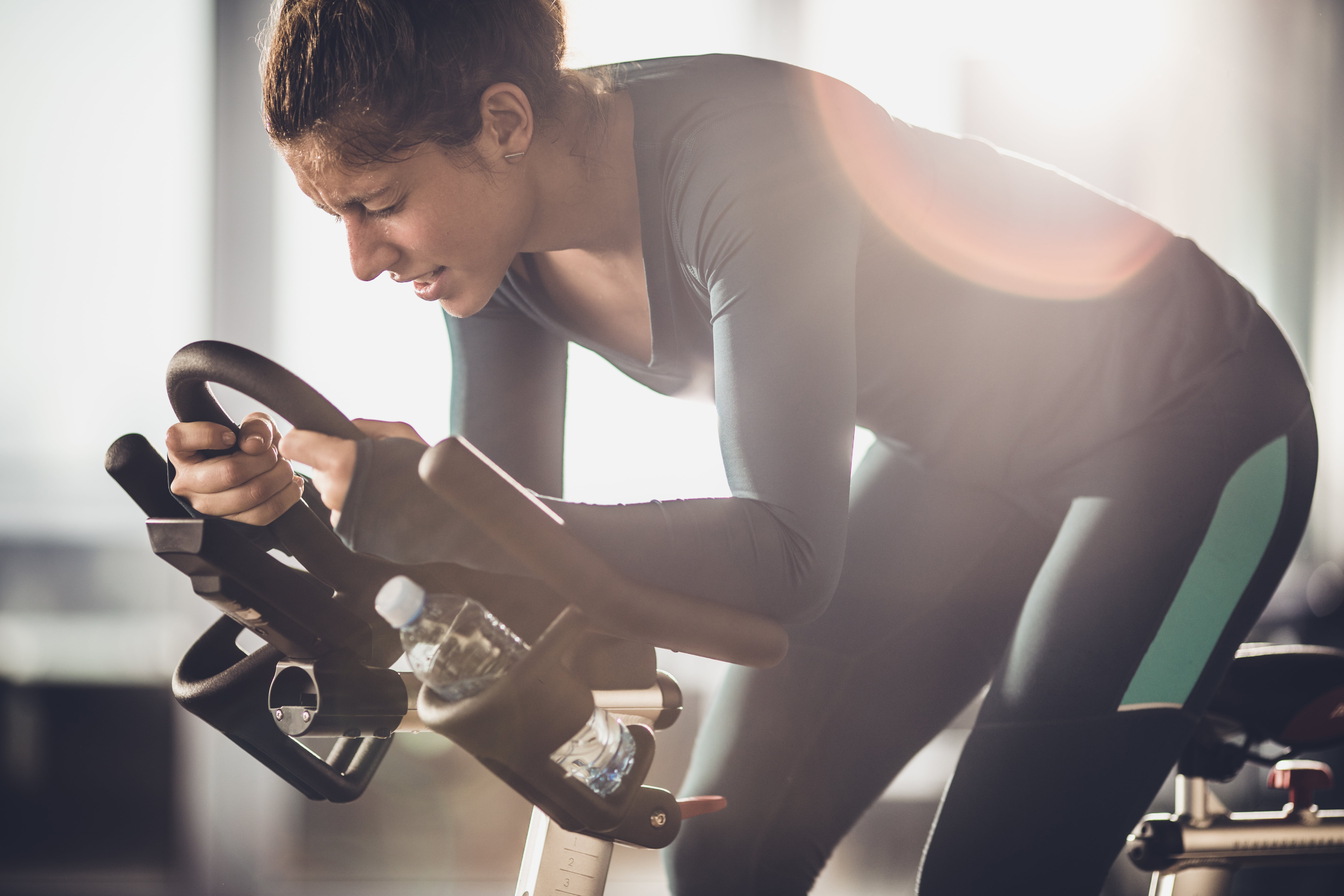 3 Common Spinning Injuries Caused By Your Bike POPSUGAR Fitness