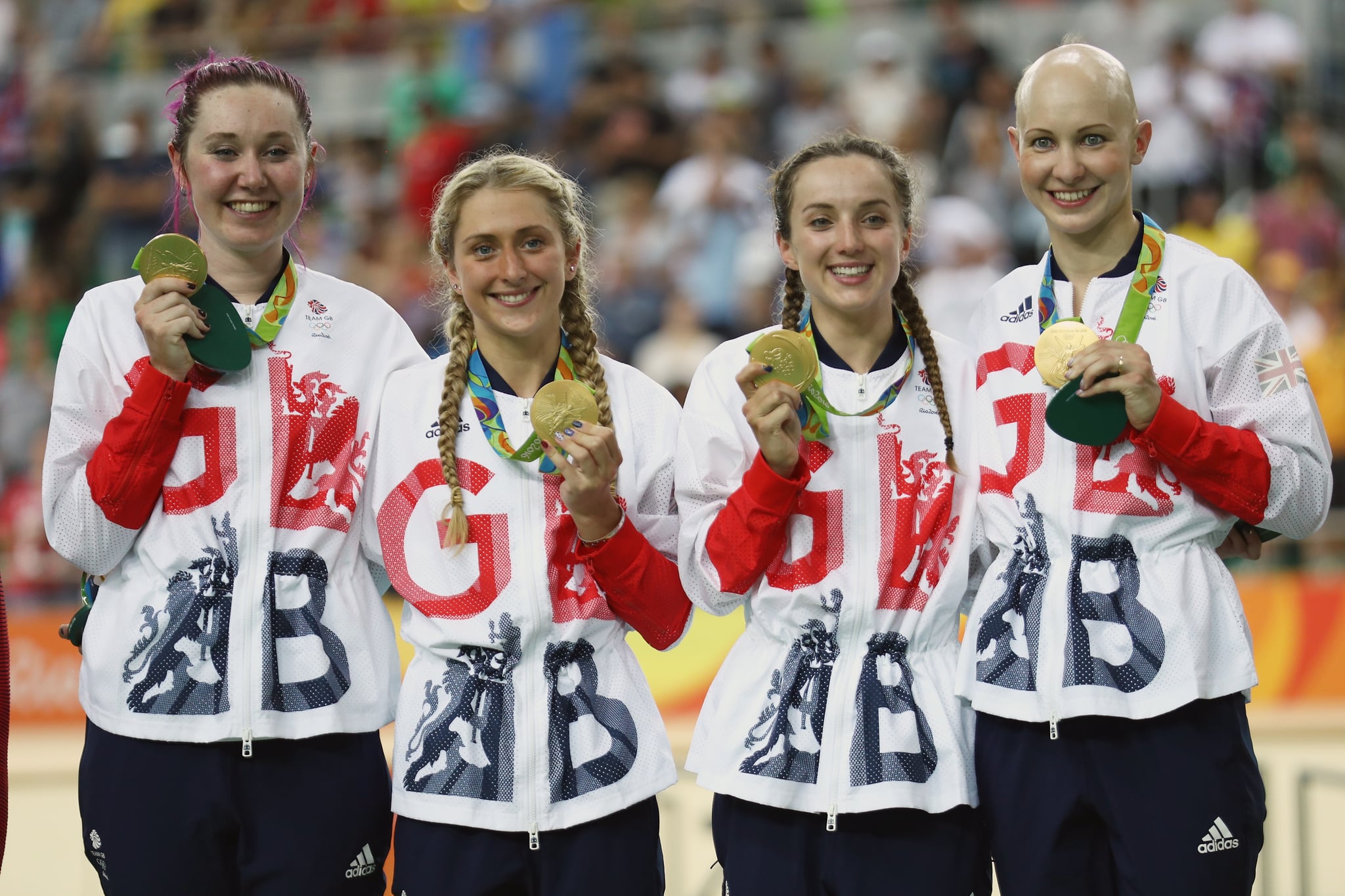 RIO DE JANEIRO, BRAZIL - AUGUST 13:  Gold medalists Laura Trott, Joanna Rowsell-Shand, Katie Archibald, Elinor Barker of Great Britain celebrate on the podium at the medal ceremony for the Women's Team Pursuit on Day 8 of the Rio 2016 Olympic Games at the Rio Olympic Velodrome on August 13, 2016 in Rio de Janeiro, Brazil.  (Photo by Bryn Lennon/Getty Images)