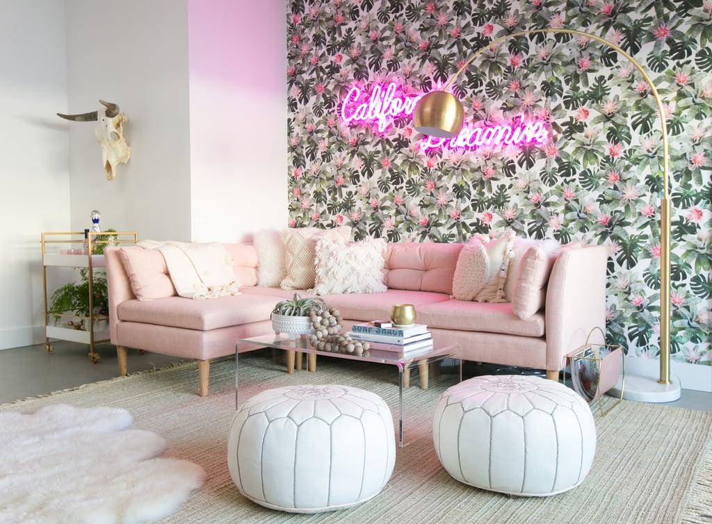 Lauren can't imagine life before her show-stopping new living room. "My absolutely favorite part of the new space has to be the blush sofa ($2,600). Not only is it a favorite because it's pink, but it's also the place where everyone gathers and relaxes," she gushed.