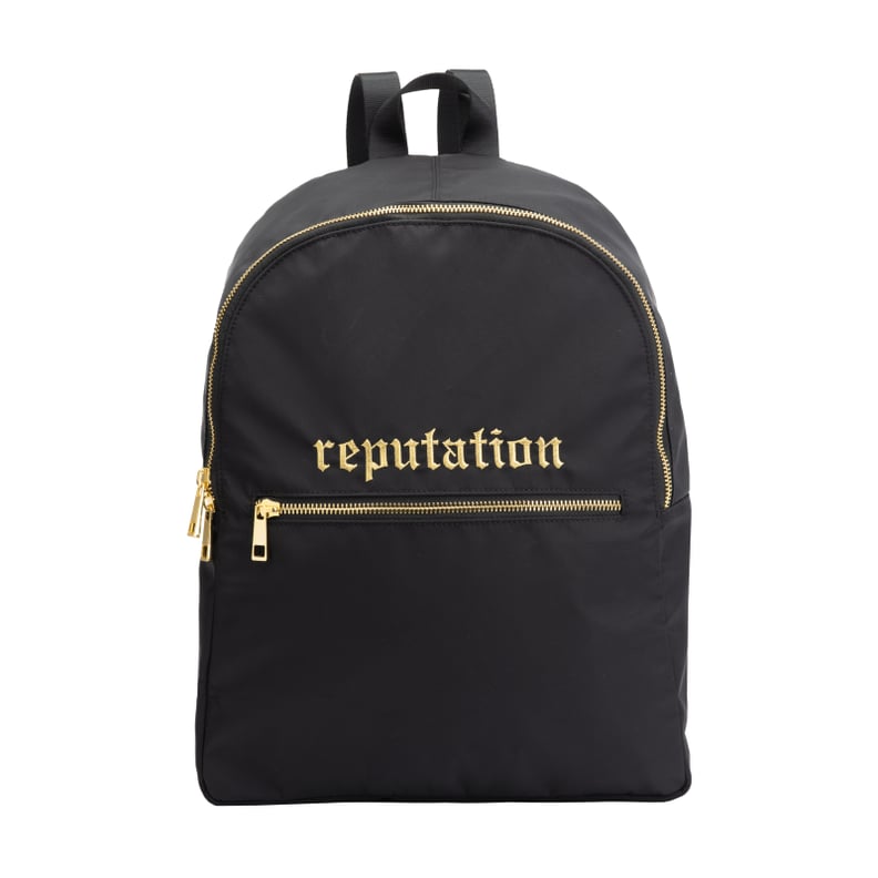 Black Backpack With Gold Tone Zippers