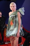 Emma Corrin’s Bizarre Goldfish-in-a-Bag Dress Needs Your Attention