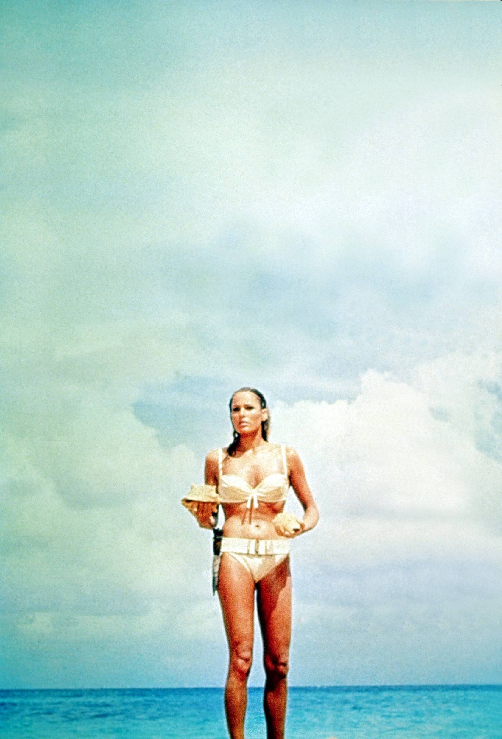 Sexy Bond girl Ursula Andress has maybe the most iconic bikini moment of al...