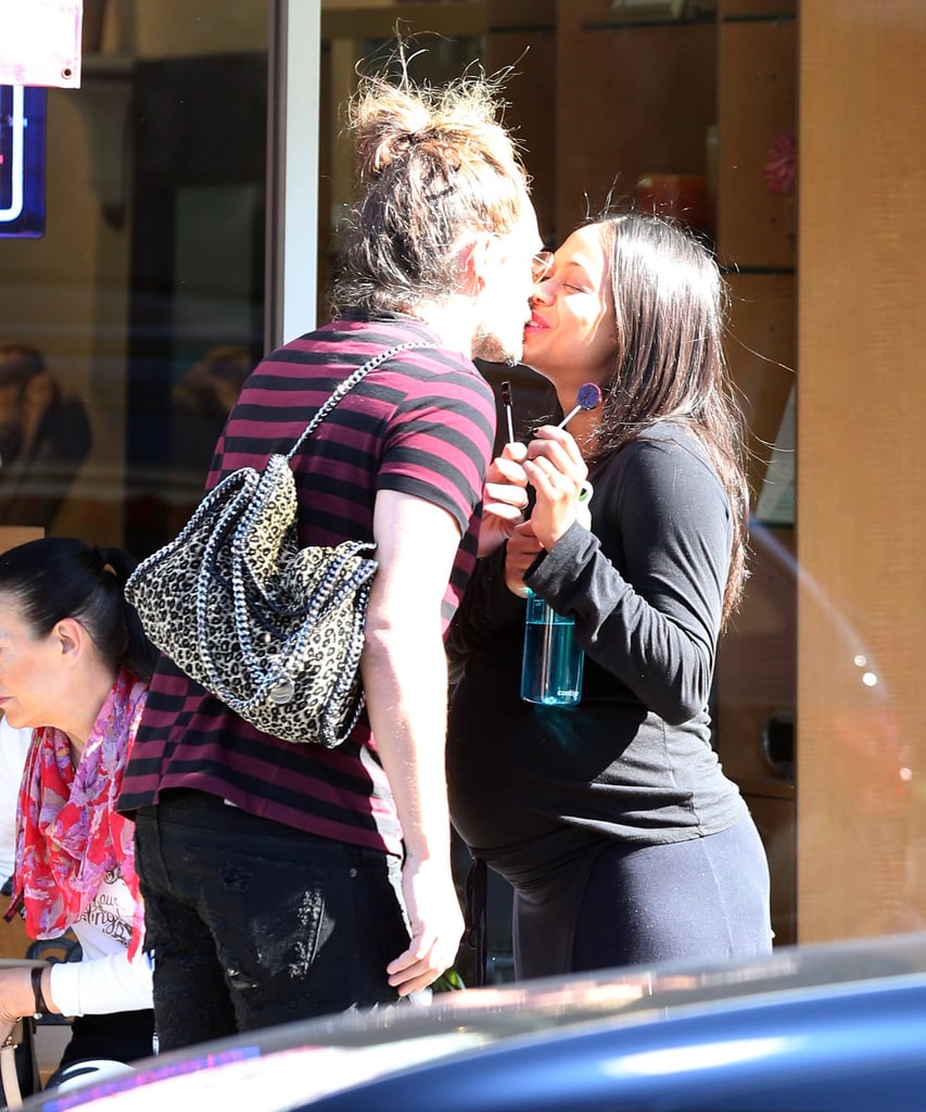 Pregnant Zoe shared a smooch with her man in November 2014.