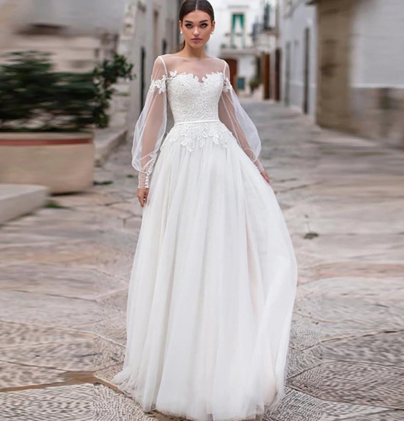 Long sleeve wedding dresses under sales 100