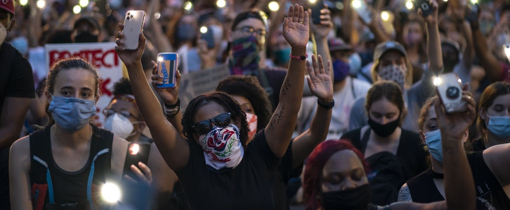Watch Washington DC Protesters Sing "Lean on Me" | Video
