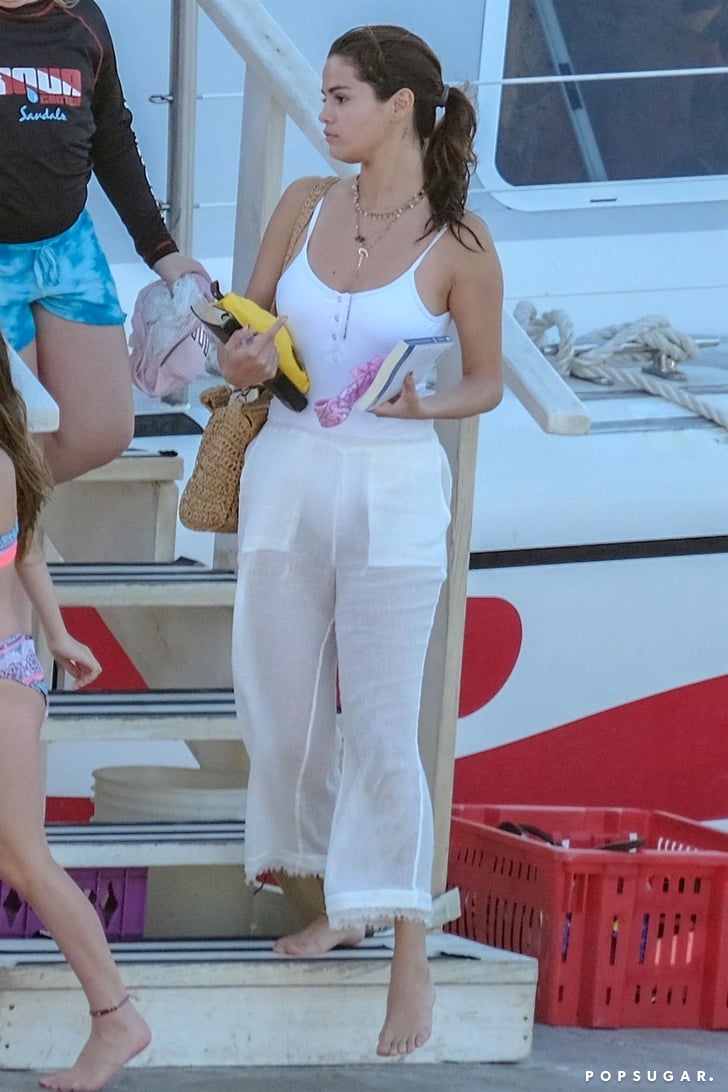 Selena Gomez's White Swimsuit With Buttons | POPSUGAR Fashion Photo 2