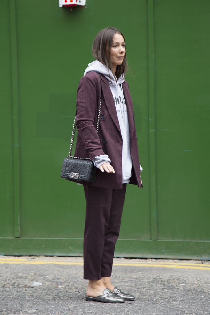 College-Sweatshirt Outfit: Work It Under Your Pantsuit With Flat Loafers