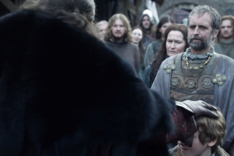 He pats lil' Rickon on the head.