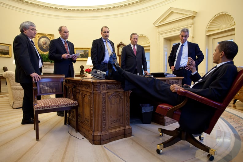 Acting cool as he takes impromptu meetings with White House aides.