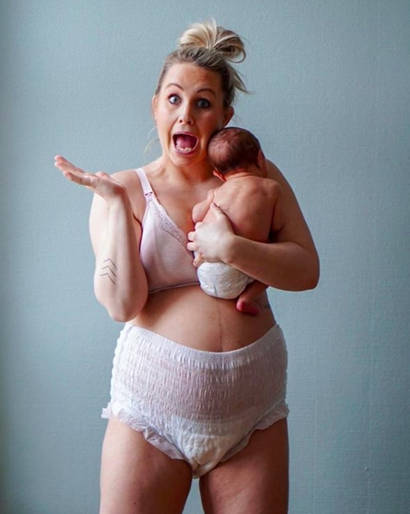 The look on this mom's face says it all: she's totally owning life postbaby.