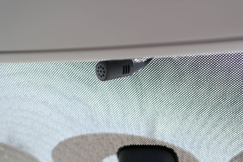 A microphone installed above the rearview mirror helps pick up clear sound.