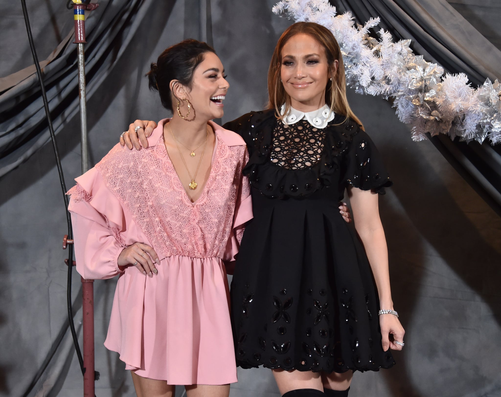 LOS ANGELES, CALIFORNIA - DECEMBER 09: Vanessa Hudgens and Jennifer Lopez attend a photo call for STX Films' 