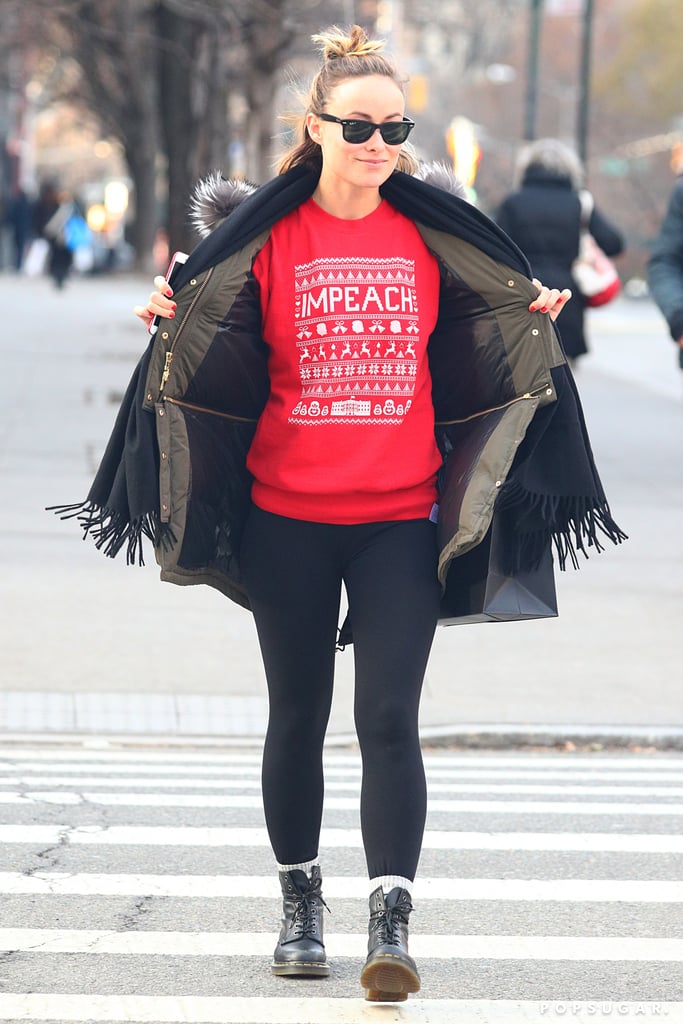 Olivia Wilde Wearing "Impeach" Holiday Sweater 2017