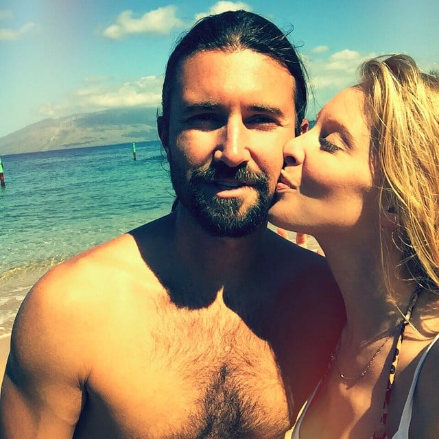 Leah showered Brandon with PDA during a beach day in Hawaii in late March.