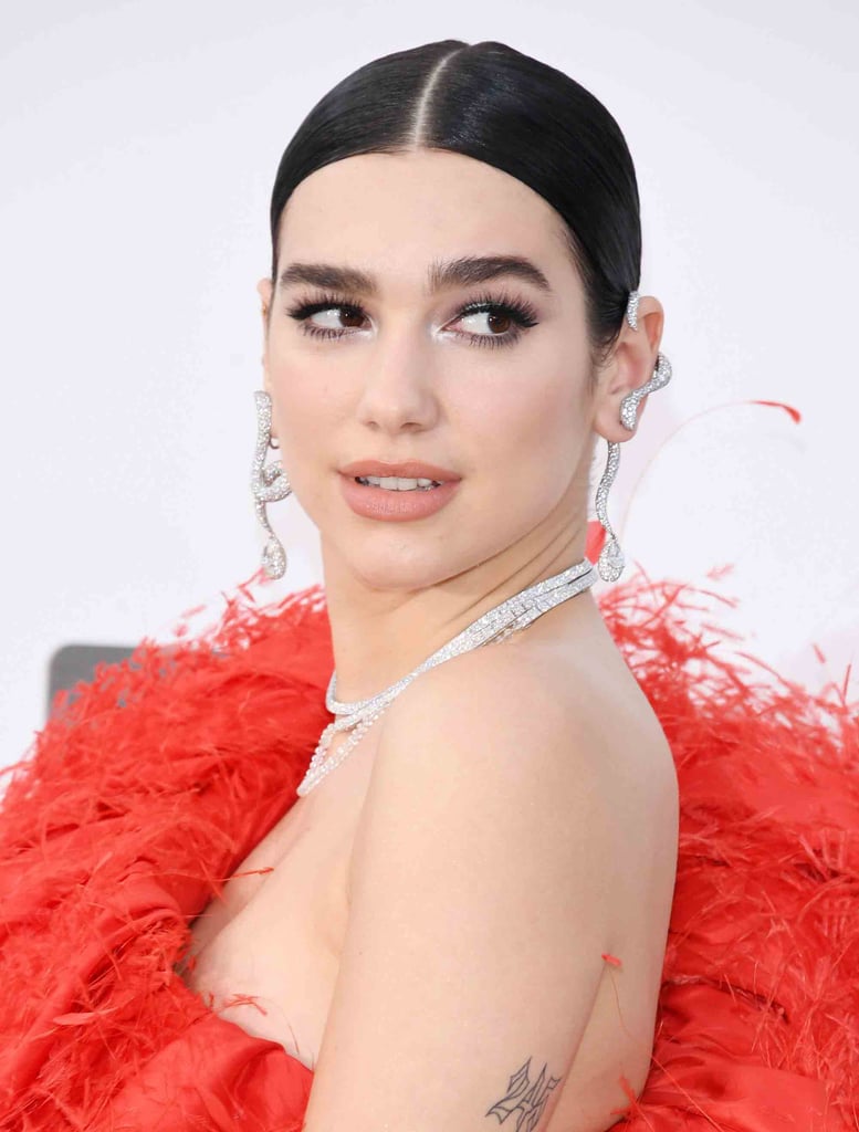 Dua Lipa's Silver Accents